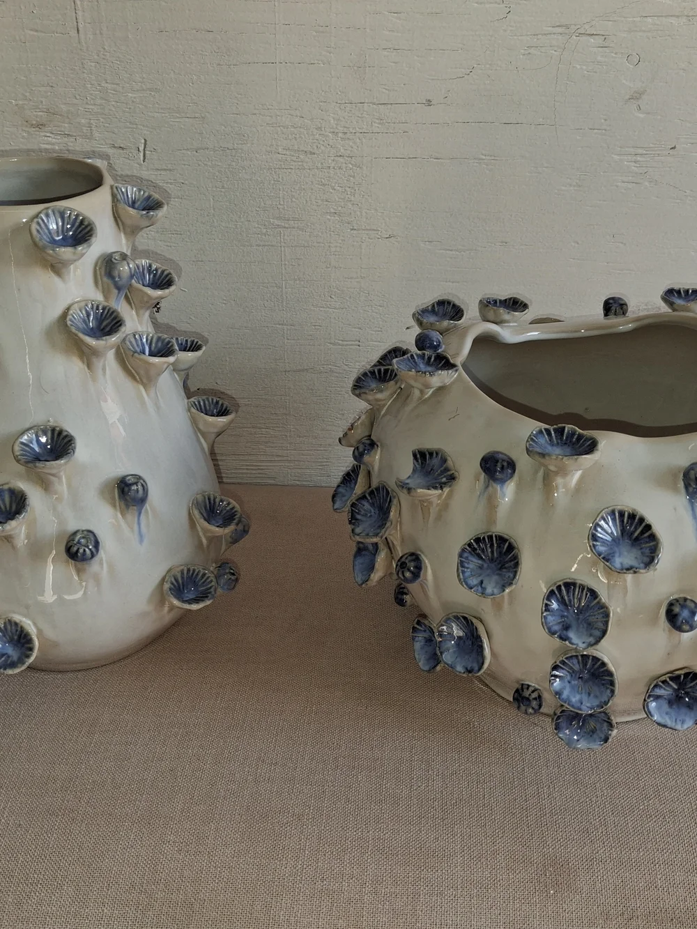 Handcrafted White Ceramic Vase with Blue Floral Accents